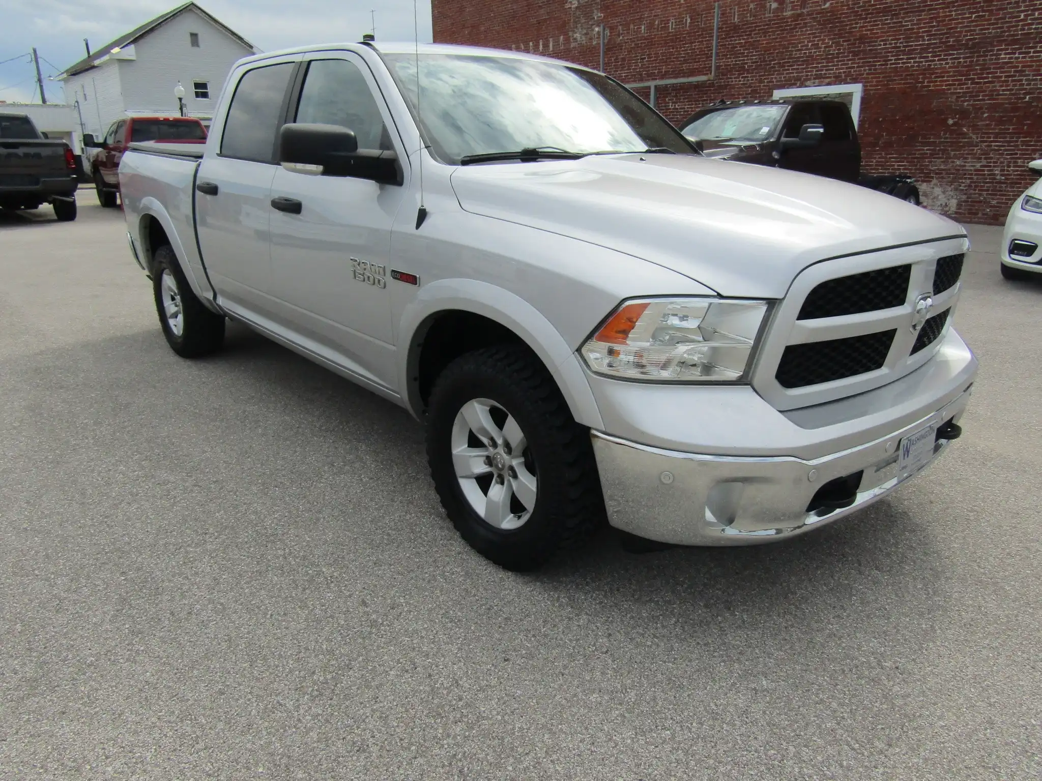 2016 RAM 1500 Outdoorsman 4WD Crew Cab 5'7's photo
