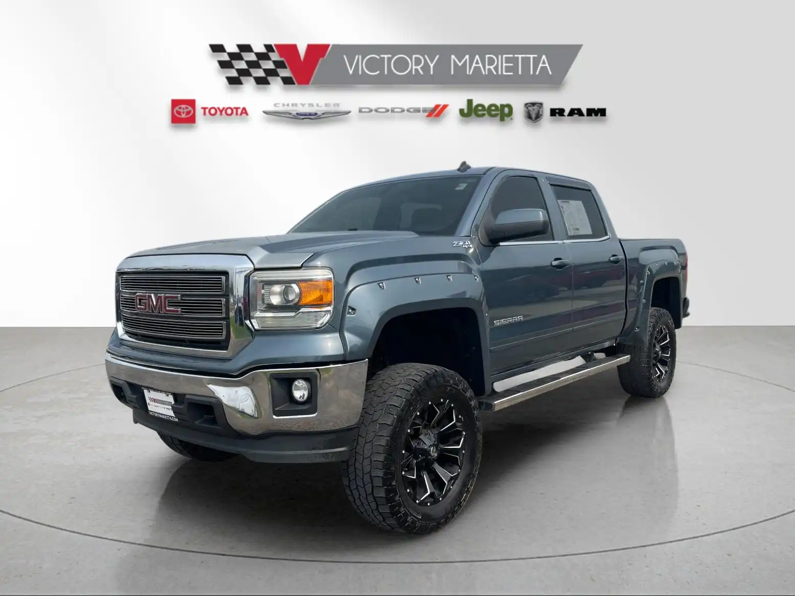 2014 GMC Sierra 4WD Crew Cab SLE LWB's photo