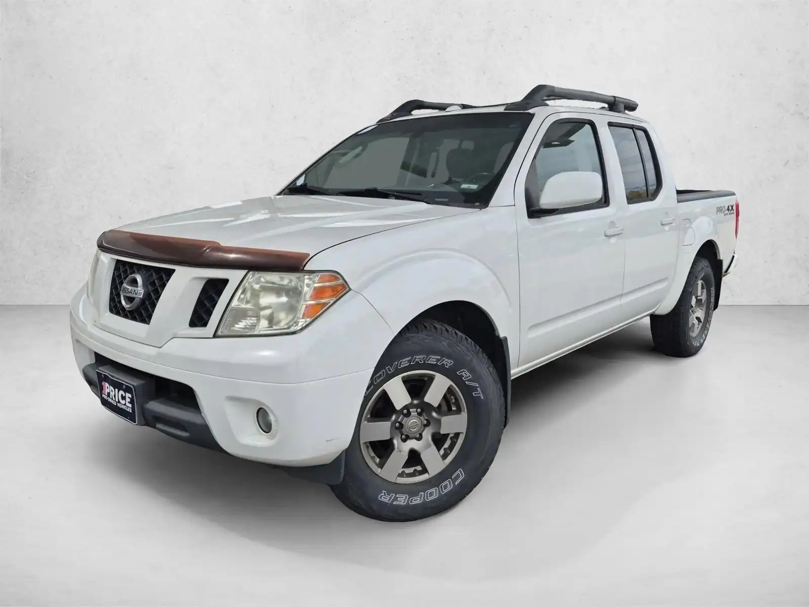 2011 Nissan Frontier 4.0 PRO-4X Crew Cab 4WD Auto's photo