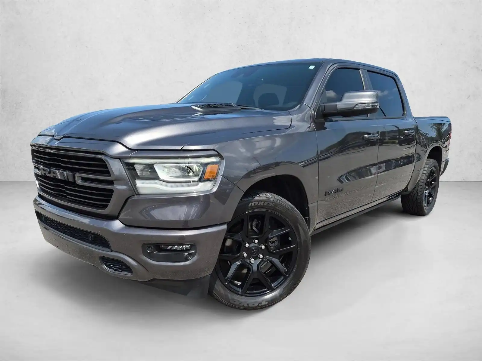 2023 RAM 1500 Laramie 4WD Crew Cab 5'7's photo