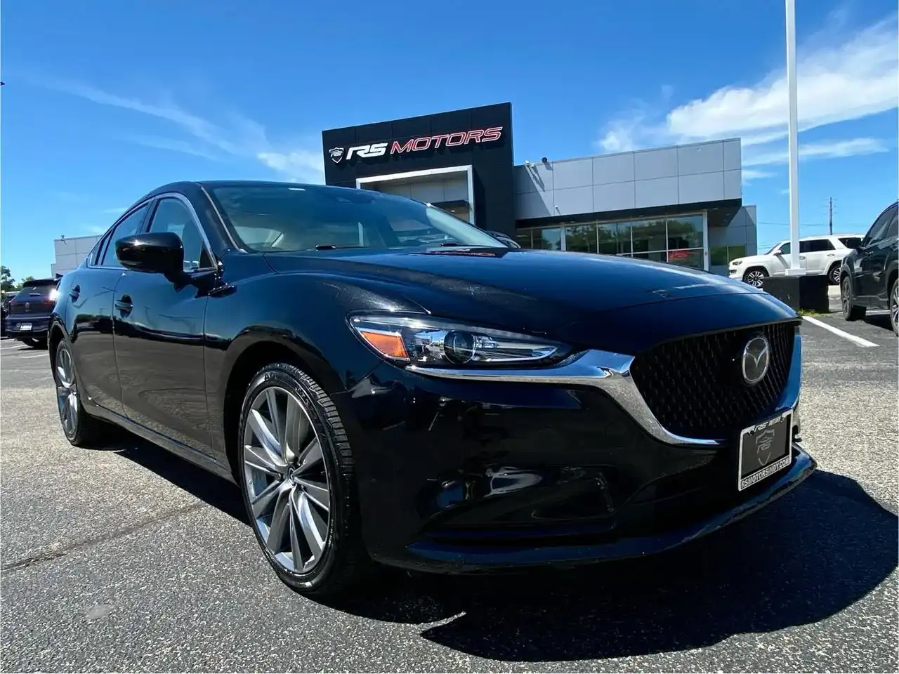 2019 Mazda EZ-6 Touring Auto's photo