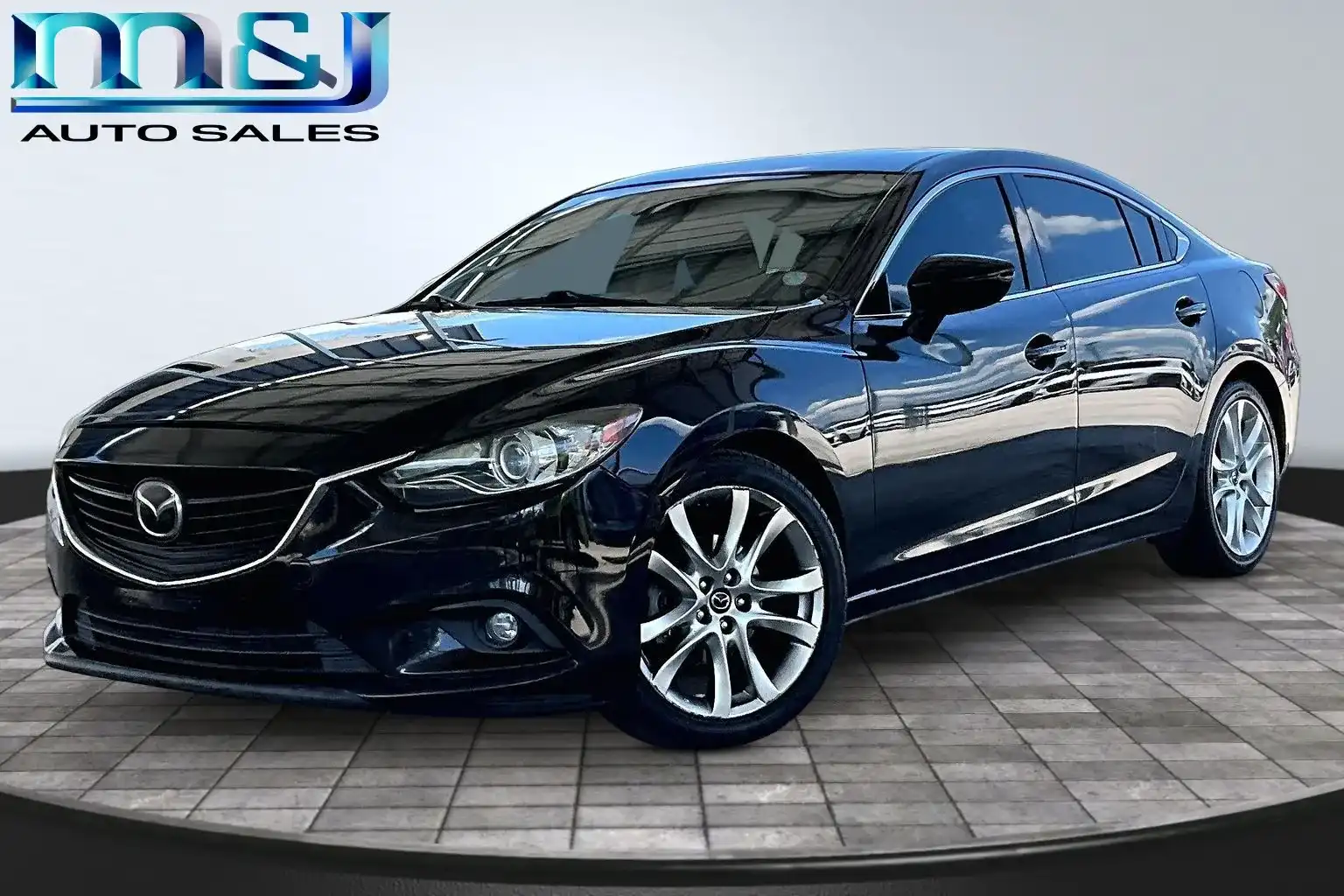 2015 Mazda EZ-6 i Grand Touring Auto's photo