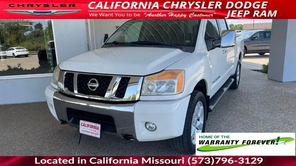 2012 Nissan Titan SL 4WD Crew Cab SWB's photo