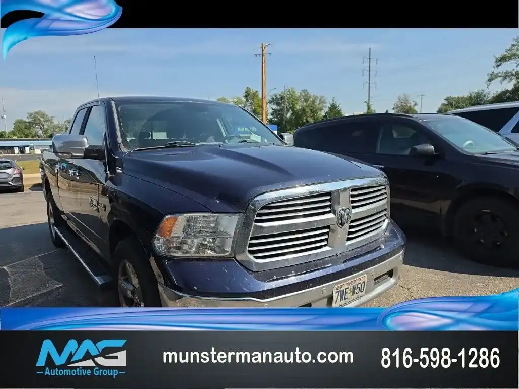 2016 RAM 1500 Big Horn 4WD Quad Cab 6'4's photo