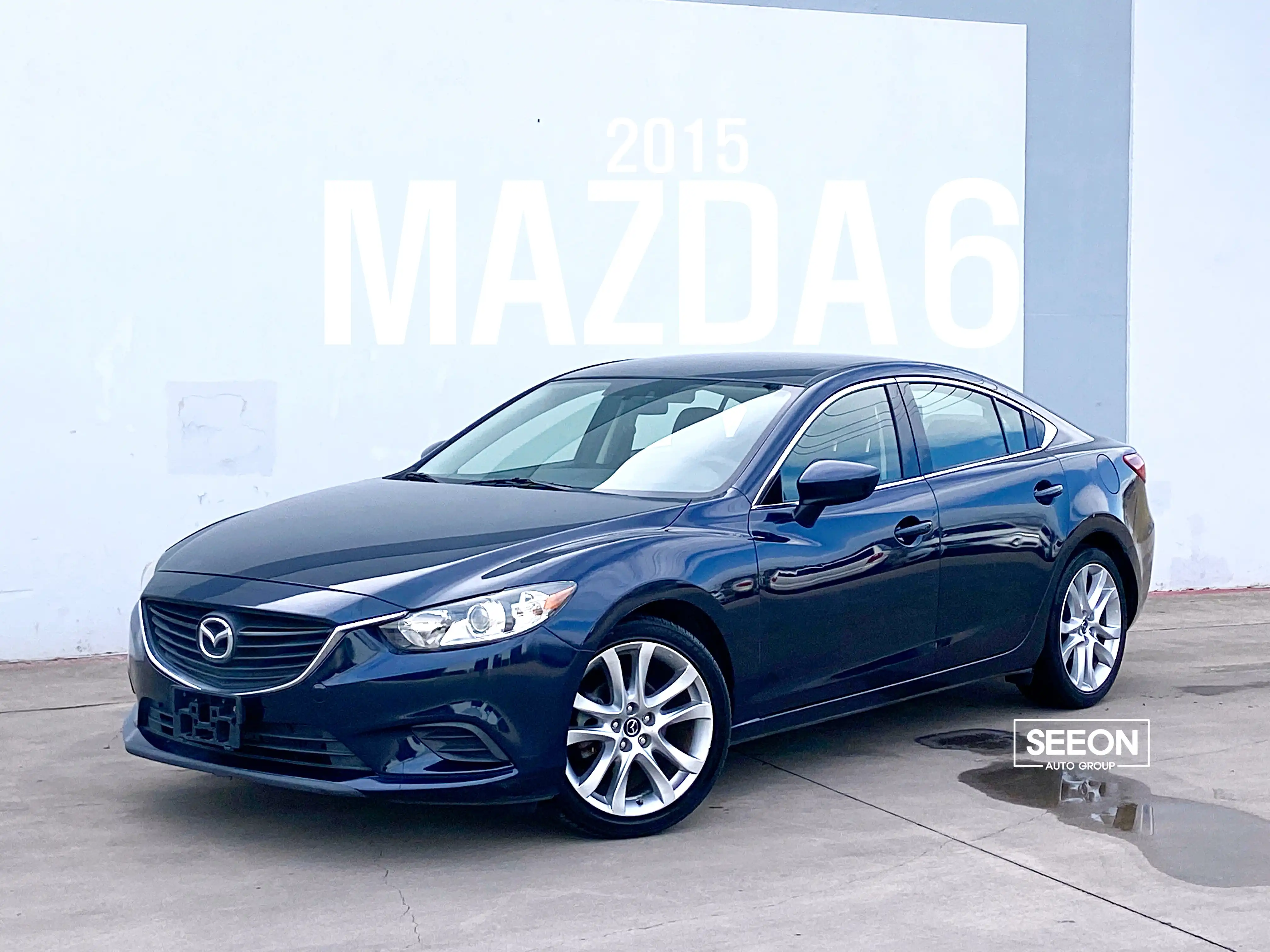 2015 Mazda EZ-6 i Touring Auto's photo