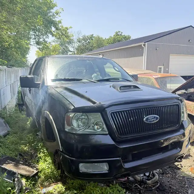 2004 Ford F-150 Lariat 4x4 SuperCab 133-in Styleside's photo