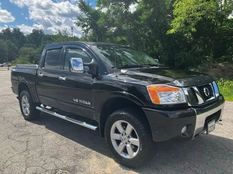 2011 Nissan Titan SL 4X4 Crew Cab SWB's photo