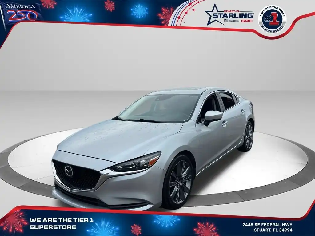 2018 Mazda EZ-6 Touring Auto's photo