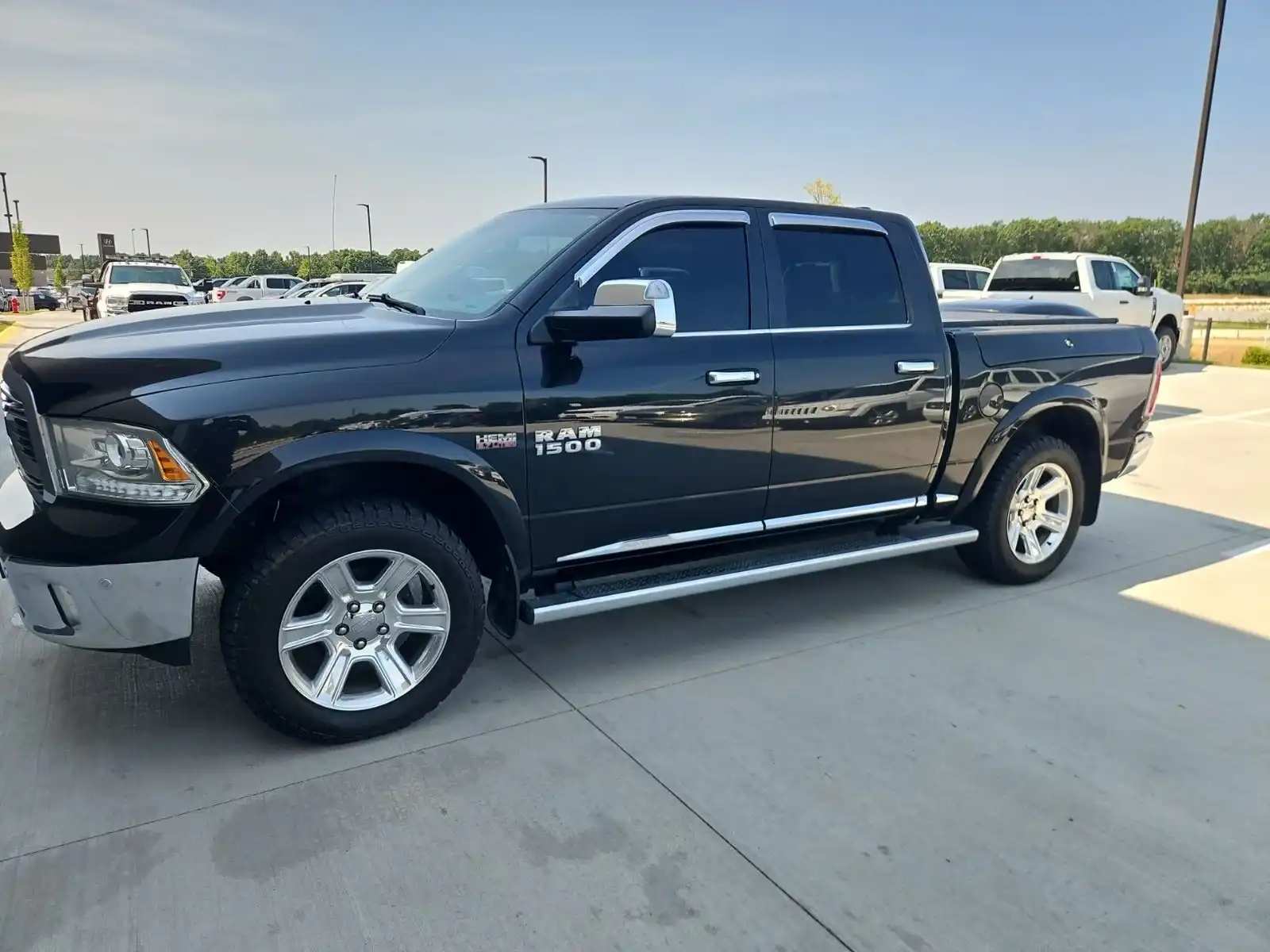 2015 RAM 1500 Laramie Limited Crew Cab 4x4 5'7" Box's photo