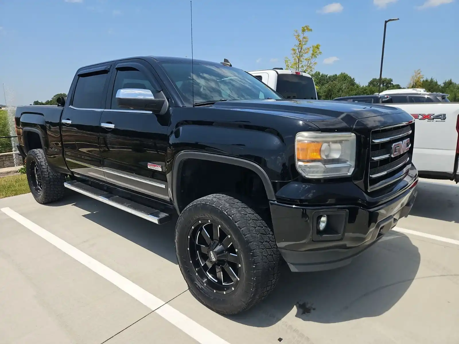 2015 GMC Sierra 4WD Crew Cab SLE SWB's photo