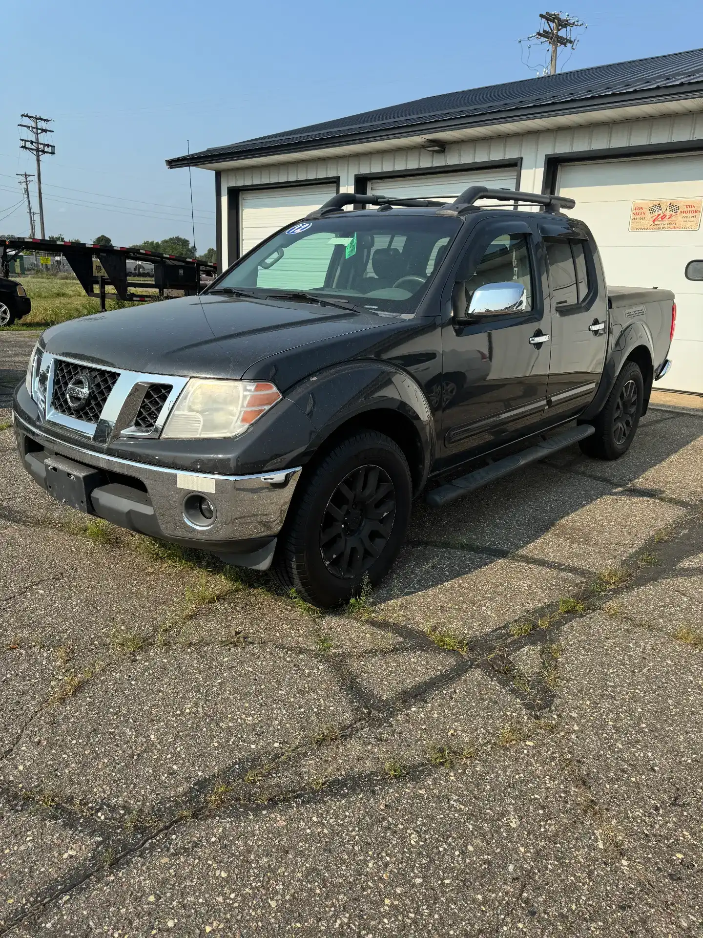 2012 Nissan Frontier 4.0 SL Crew Cab 4WD Auto SWB's photo