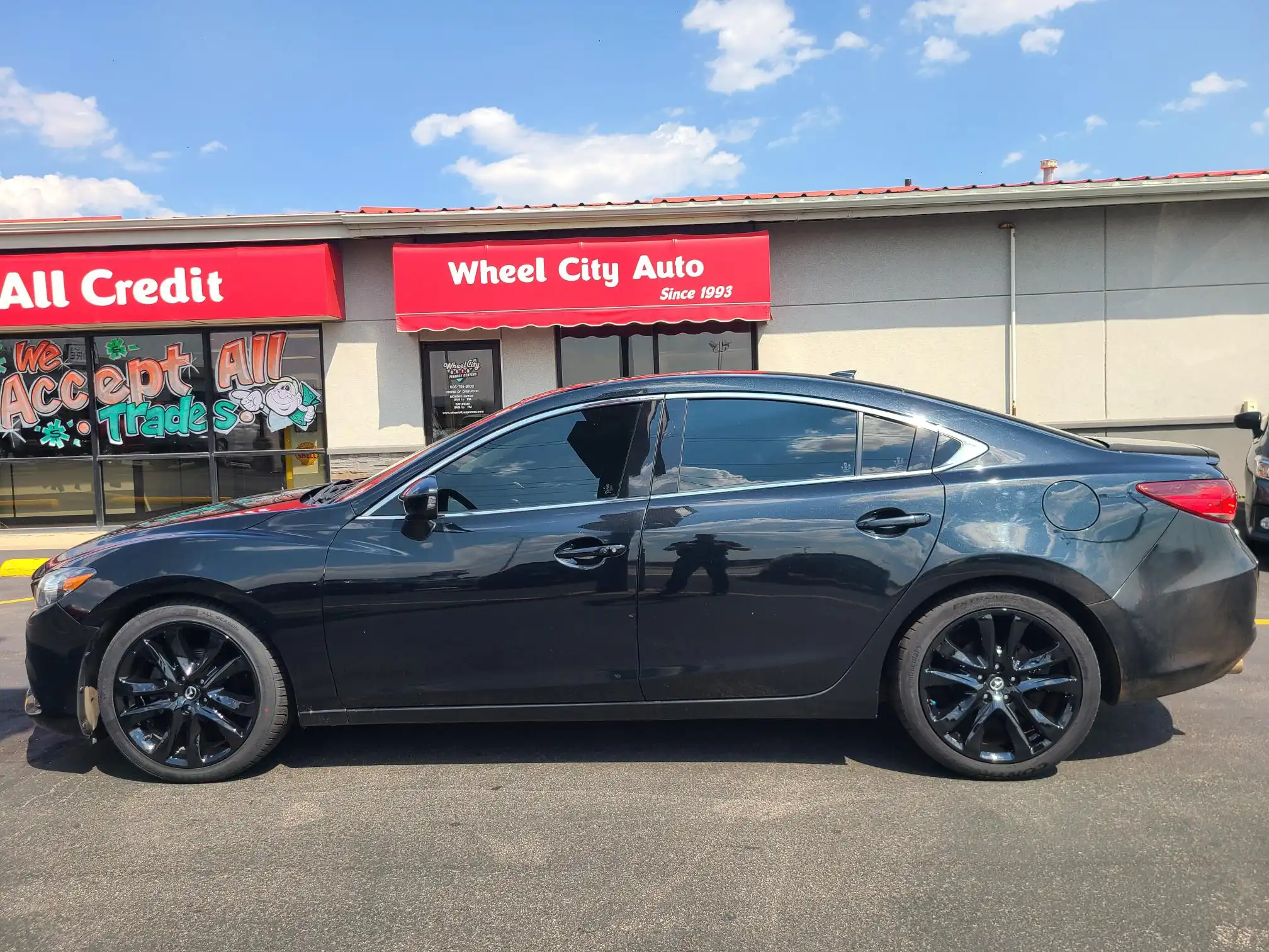 2015 Mazda EZ-6 i Grand Touring Auto's photo