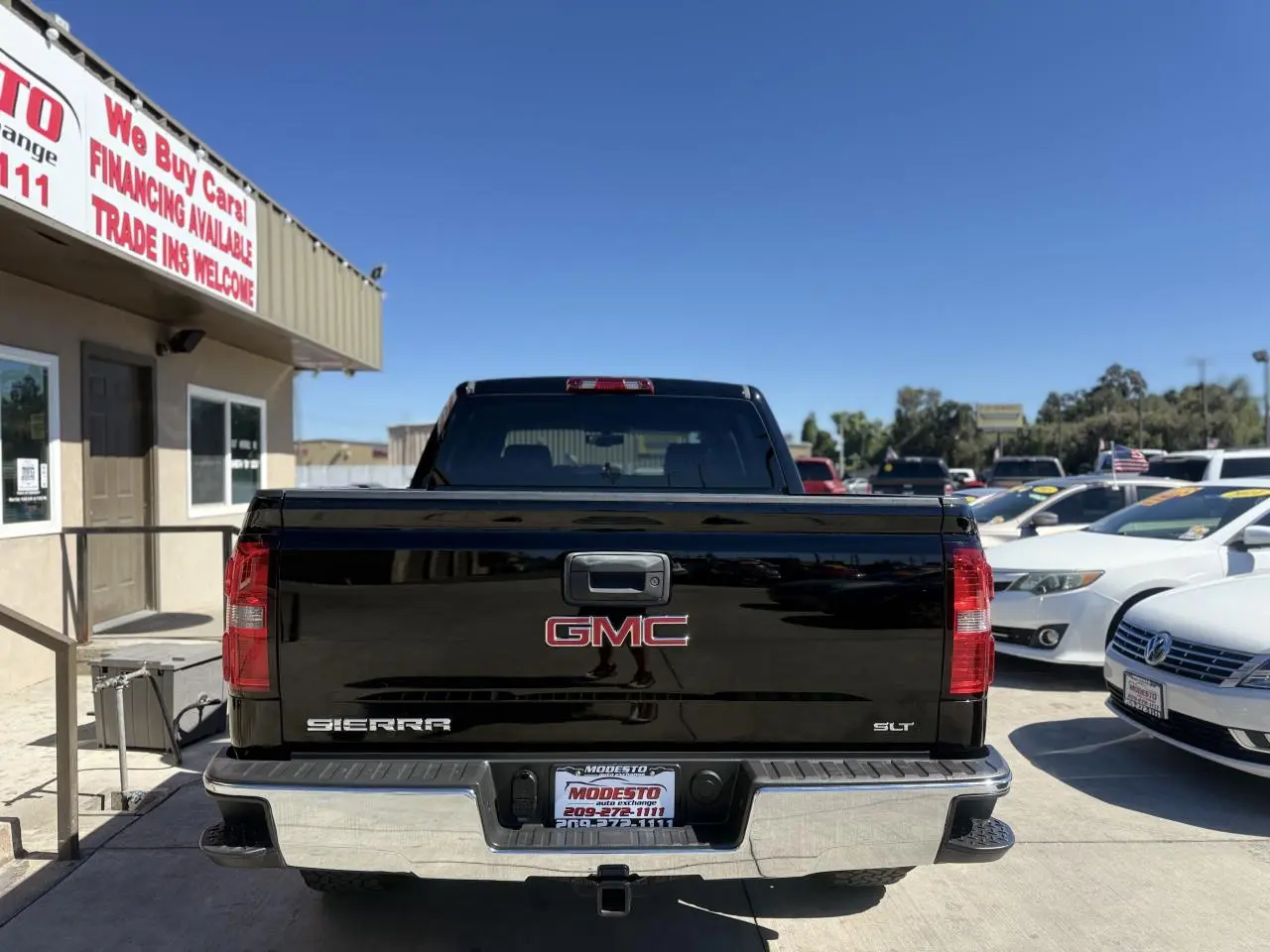 2015 GMC Sierra 4WD Crew Cab SLT SWB photo 4