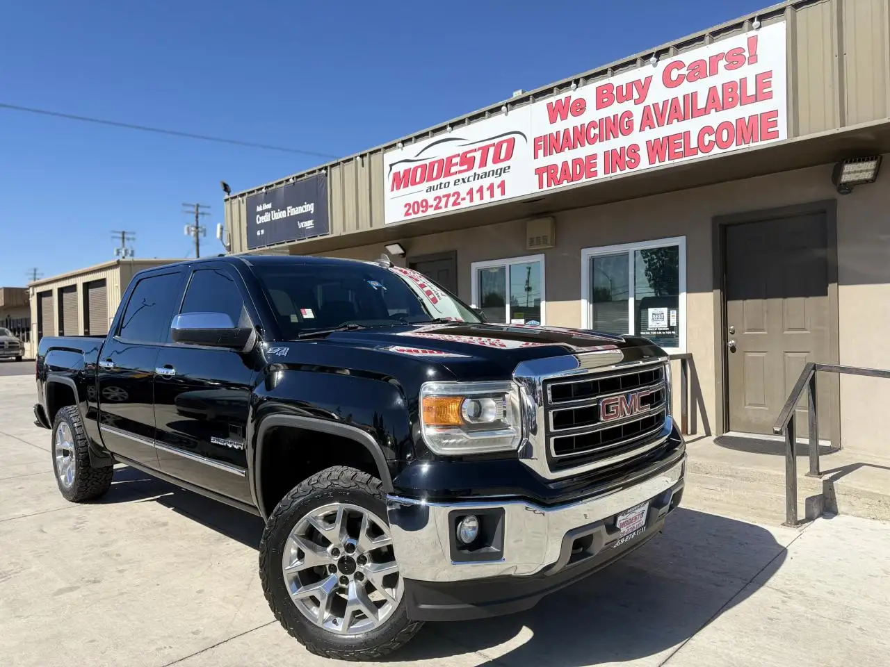 2015 GMC Sierra 4WD Crew Cab SLT SWB photo 1
