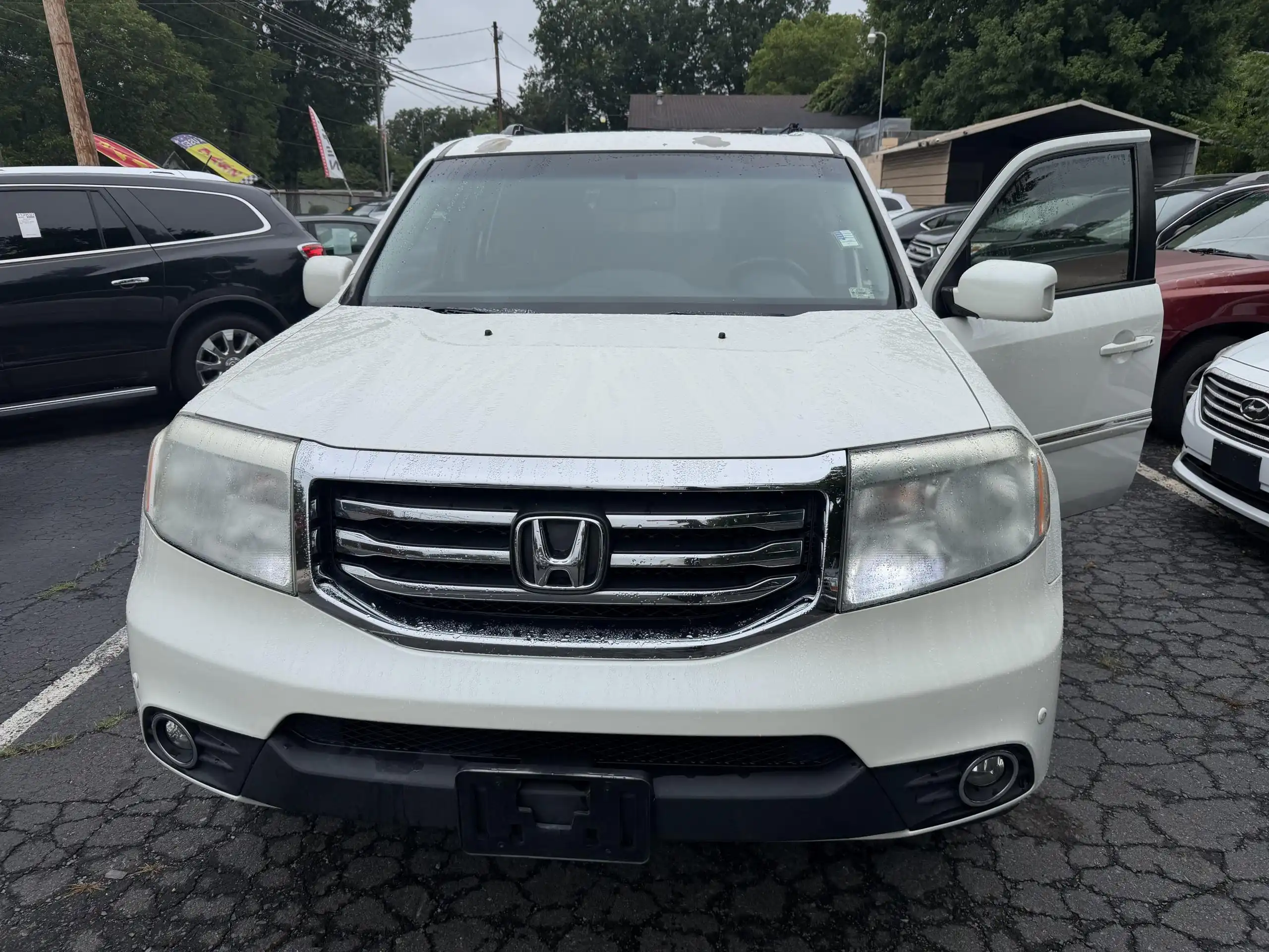2012 Honda Pilot Touring 4WD w/ NAVI and RES's photo