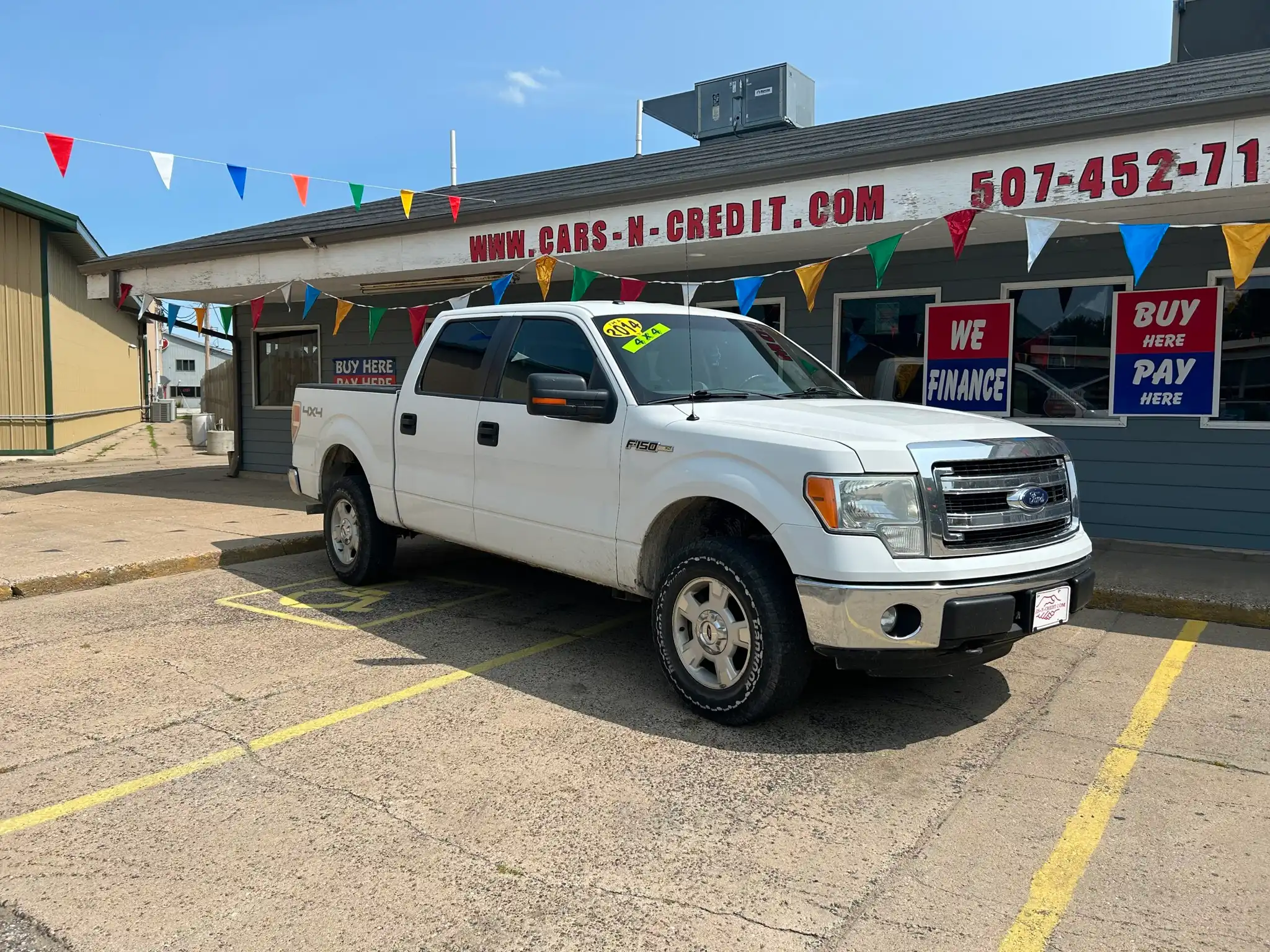 2014 Ford F-150 XLT 4WD SuperCrew 145 in's photo