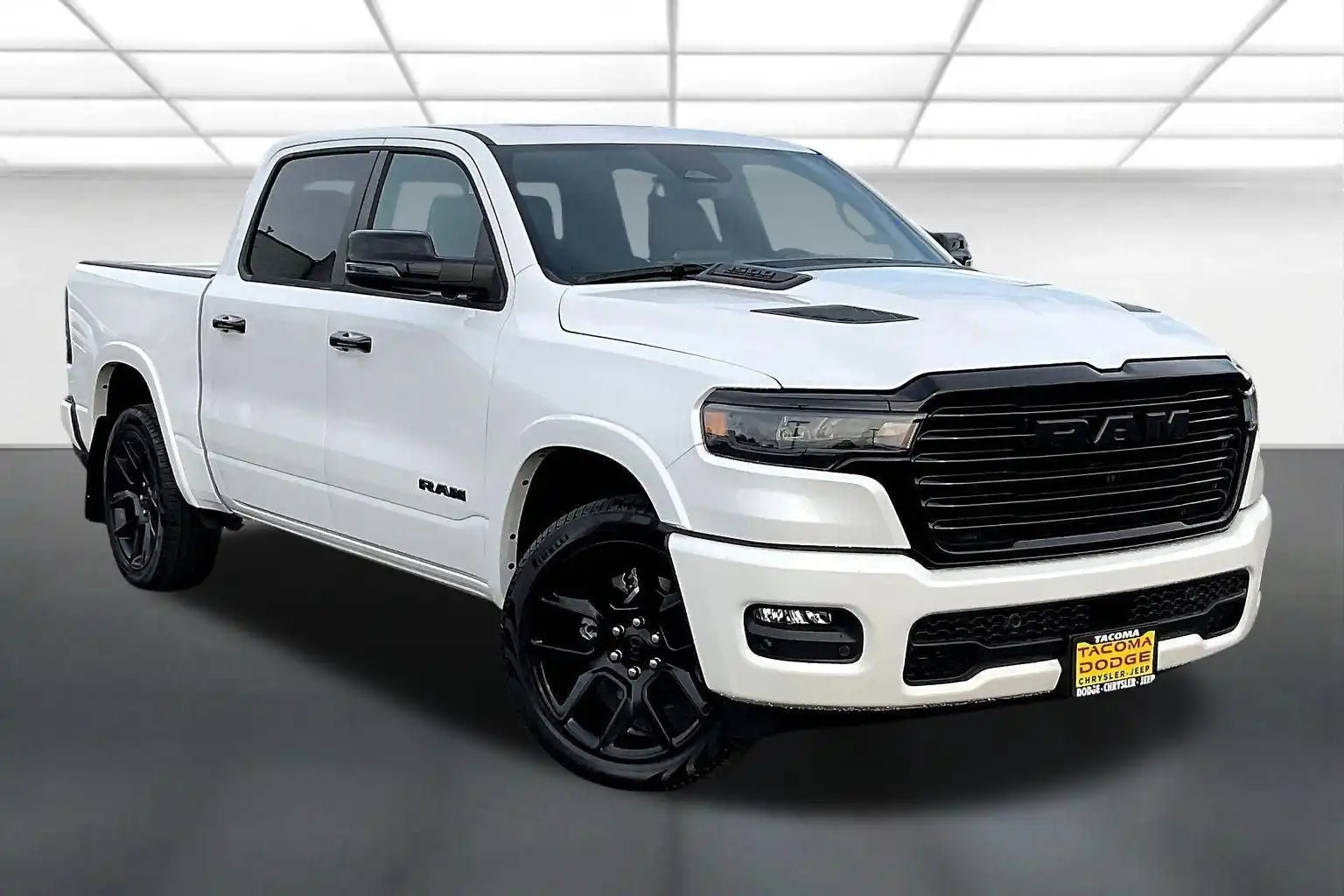 2026 RAM 1500 Laramie 4WD Crew Cab 5'7's photo