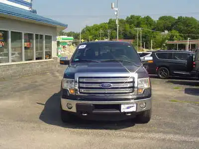 2014 Ford F-150 Lariat 4WD SuperCab 145 in's photo