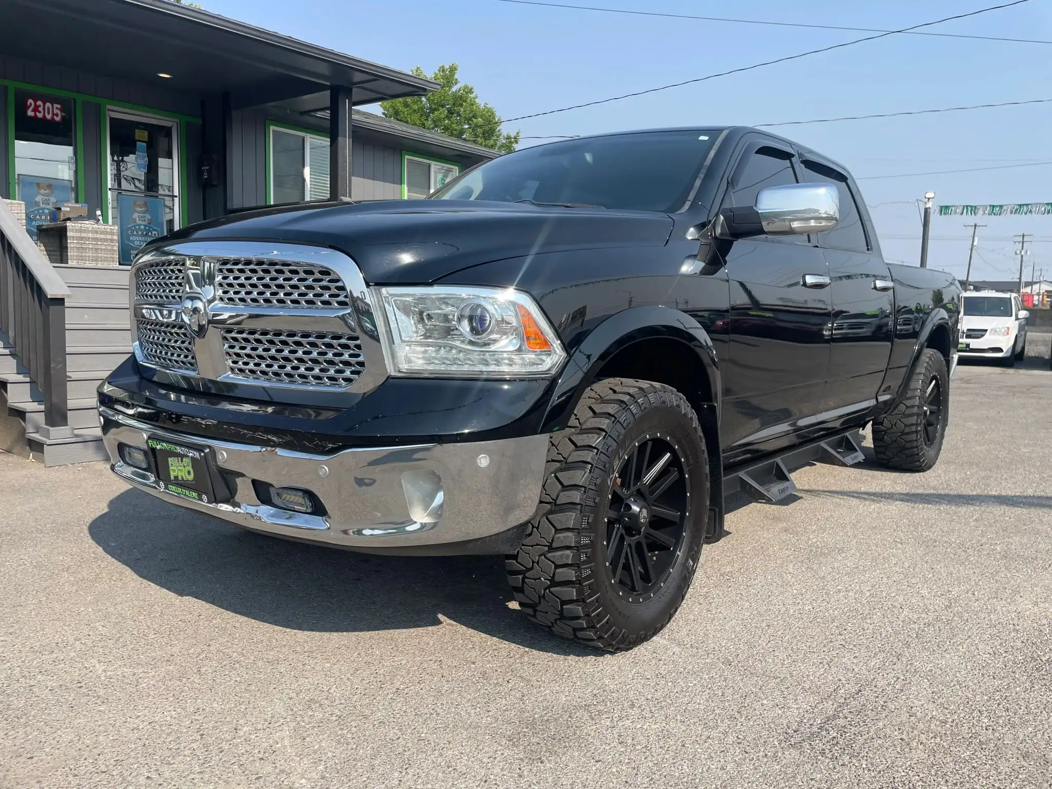 2014 RAM 1500 Laramie Crew Cab 4WD 149"WB's photo