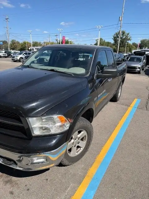 2012 RAM 1500 SLT 4WD Quad Cab photo 1