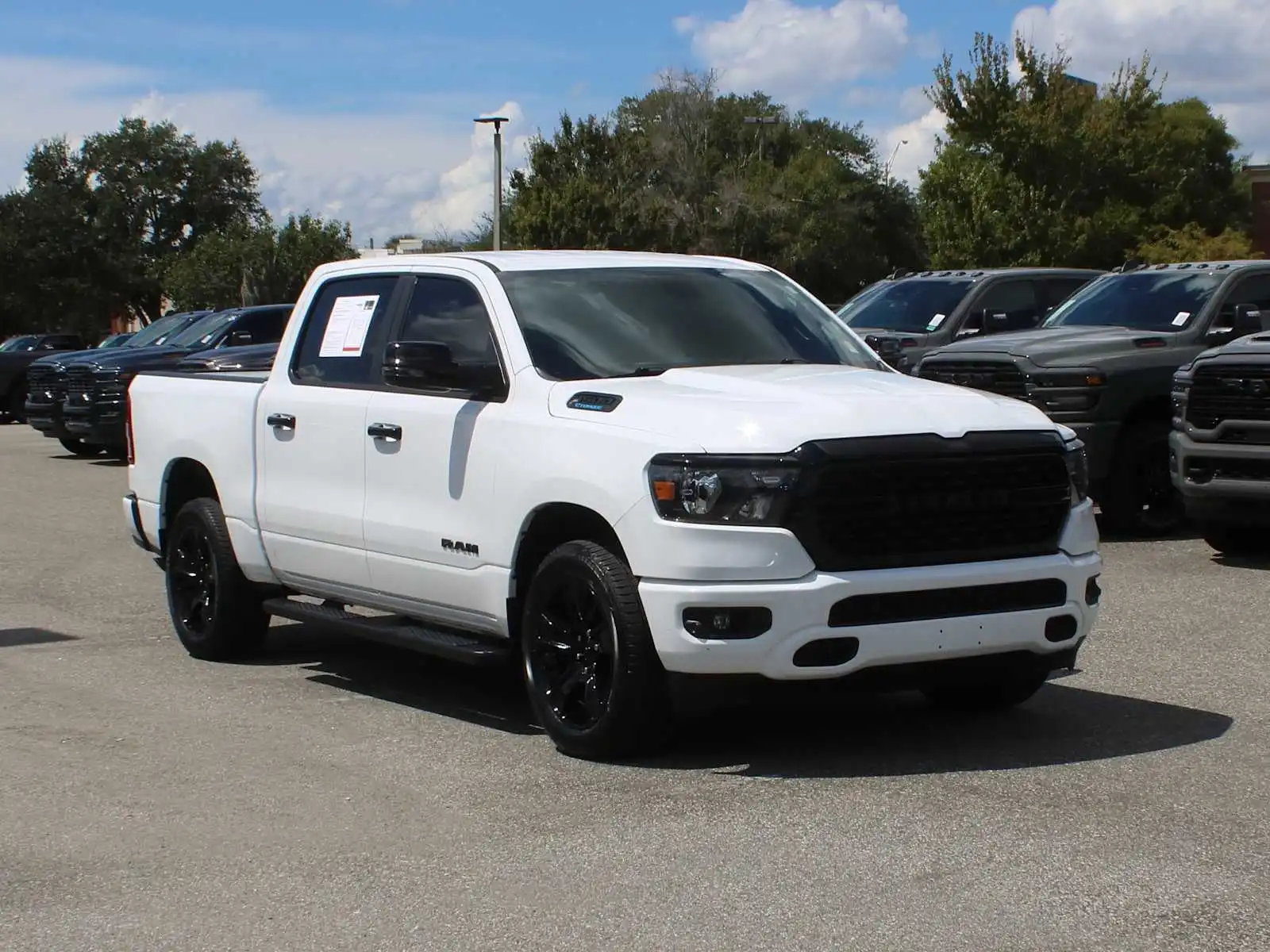 2024 RAM 1500 Big Horn/Lone Star 4WD Crew Cab 5'7's photo