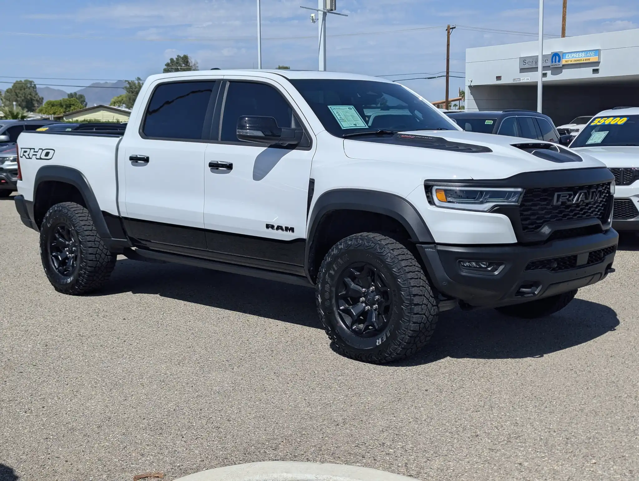 2026 RAM 1500 RHO 4WD Crew Cab 5'7's photo