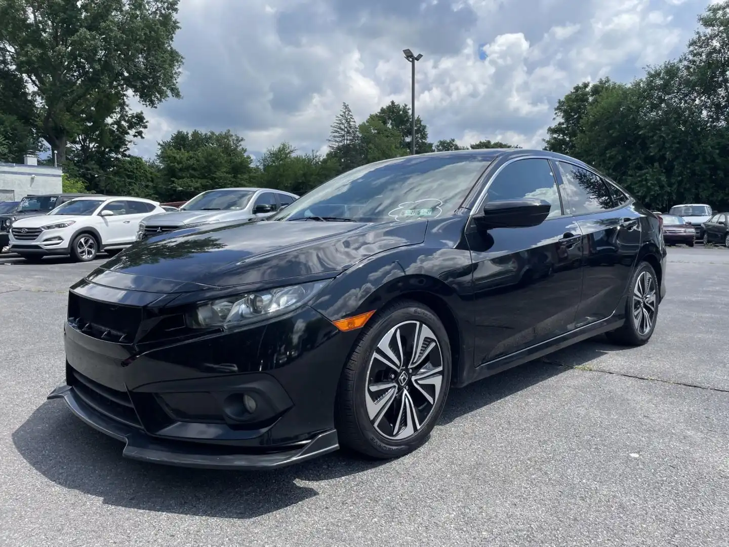 2016 Honda Civic EX-T with Honda Sensing CVT's photo