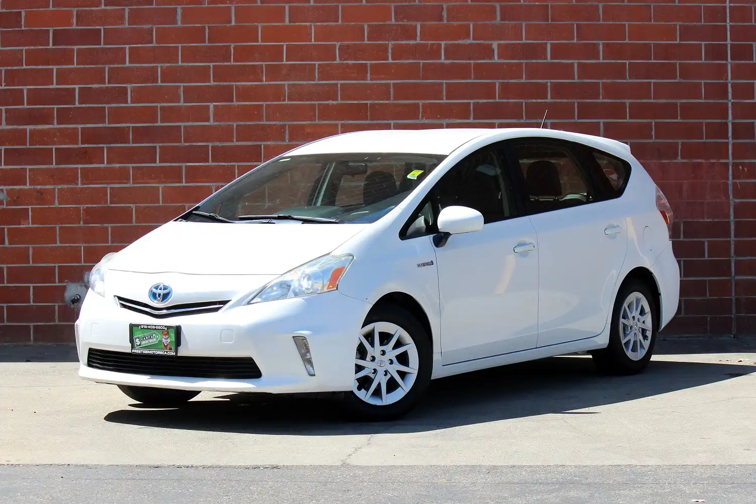 2012 Toyota Prius v Three's photo