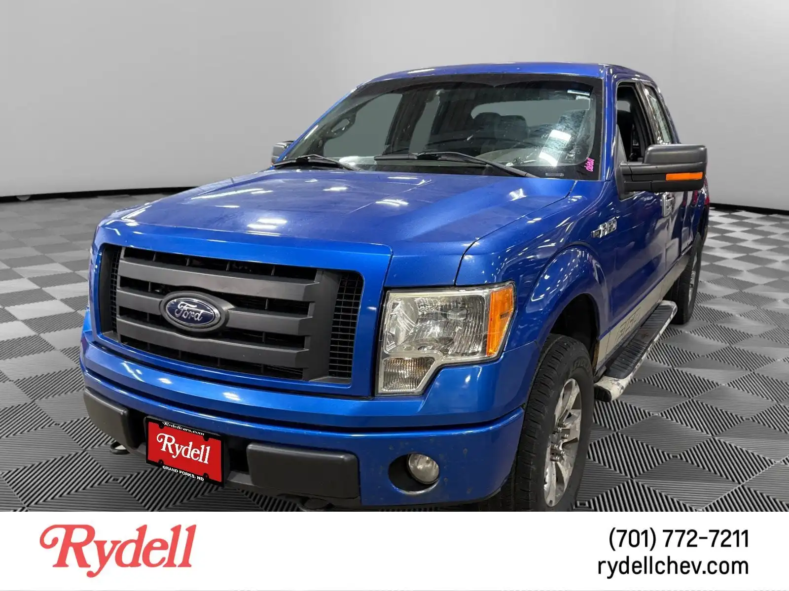2012 Ford F-150 Lariat 4WD SuperCab 145 in's photo