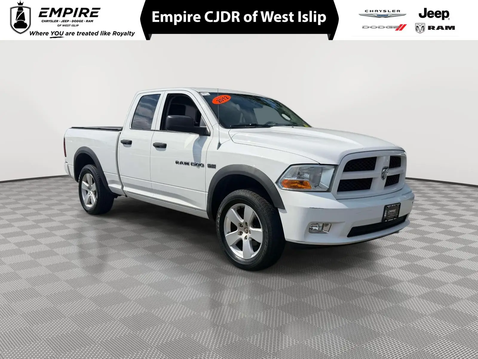 2012 RAM 1500 Express 4WD Quad Cab photo 1