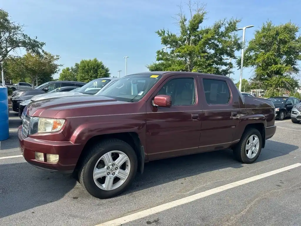 2009 Honda Ridgeline 3.5 Auto RTL w/Leather and Navi's photo