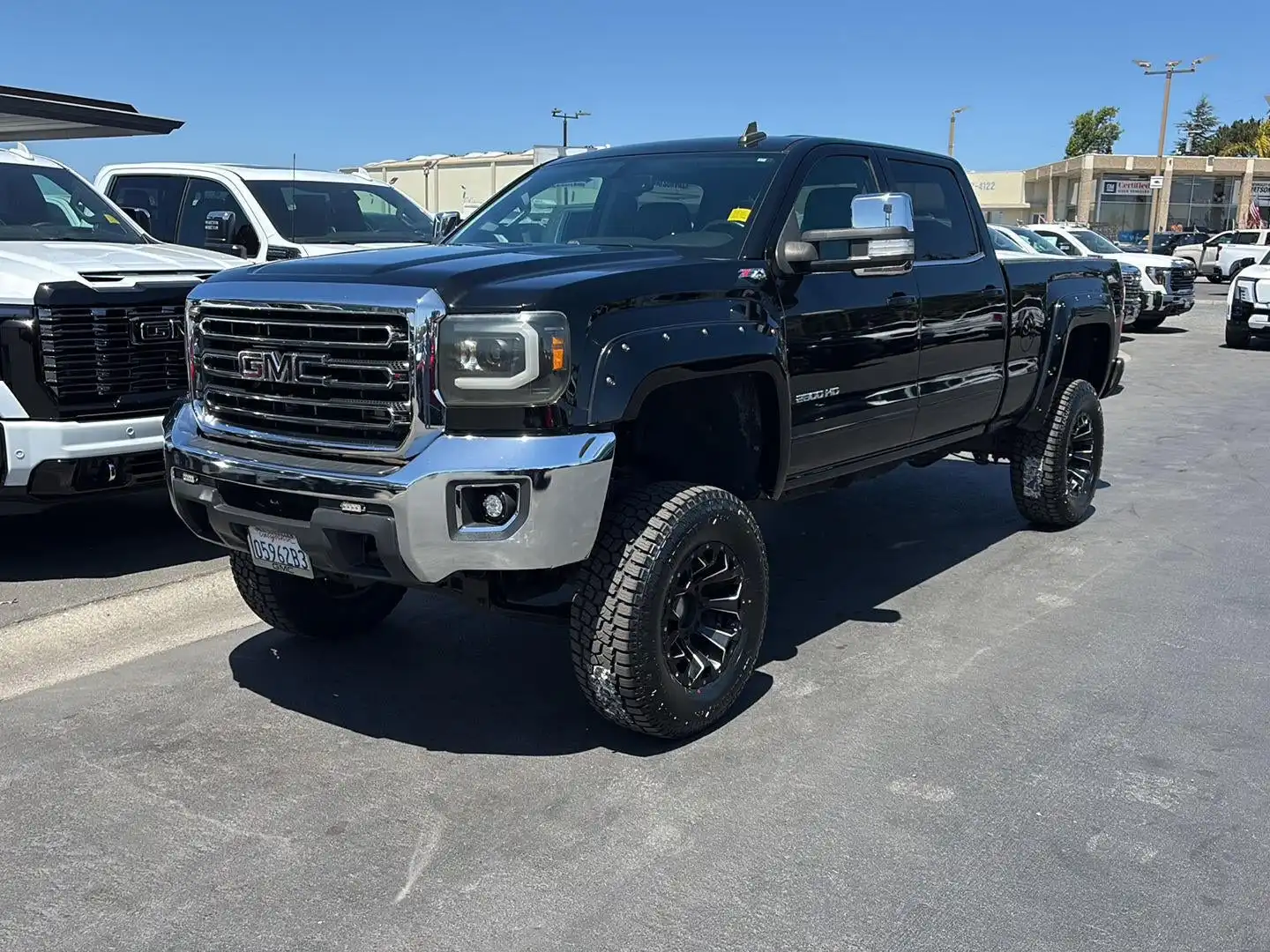 2015 GMC Sierra 4WD Crew Cab Short Box SLE's photo