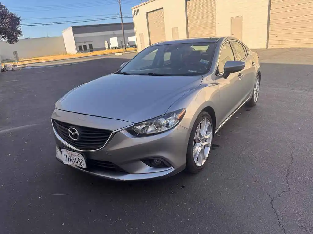 2015 Mazda EZ-6 i Touring Auto's photo