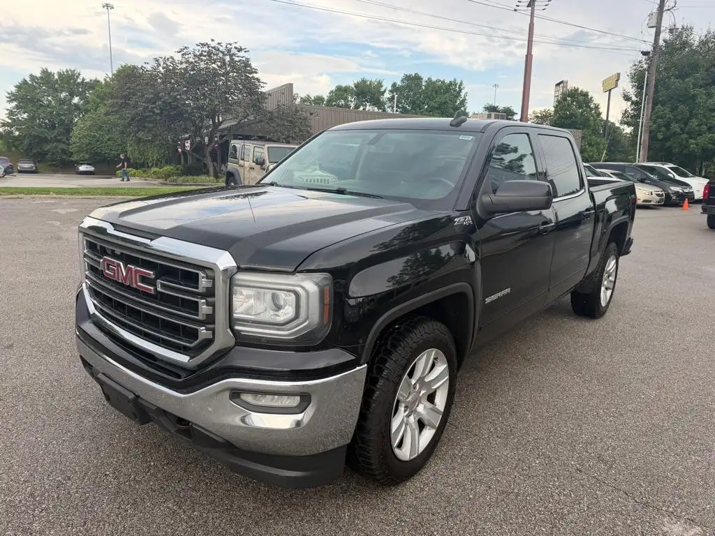 2016 GMC Sierra 4WD Crew Cab Short Box SLE's photo